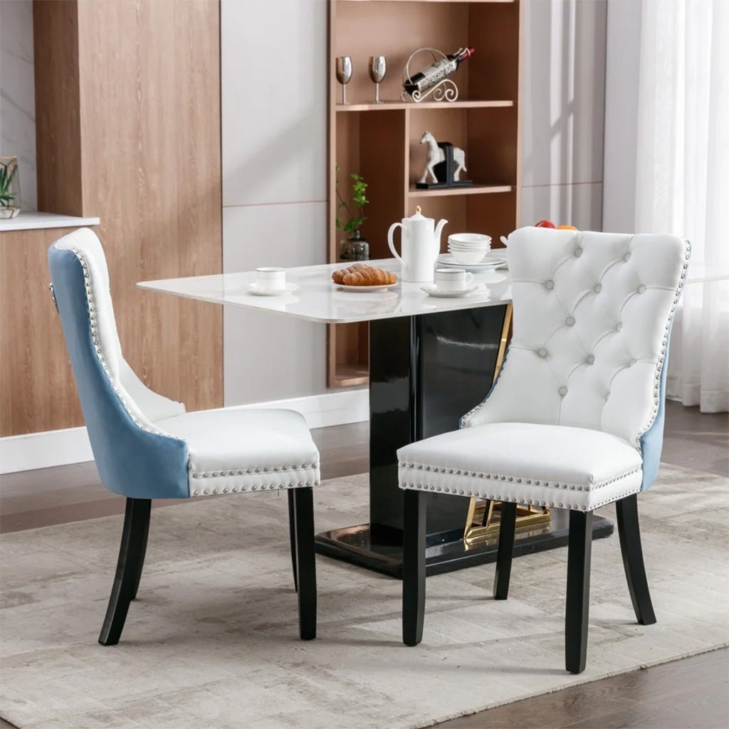 A dining chair styled as extra seating in a modern living room.
