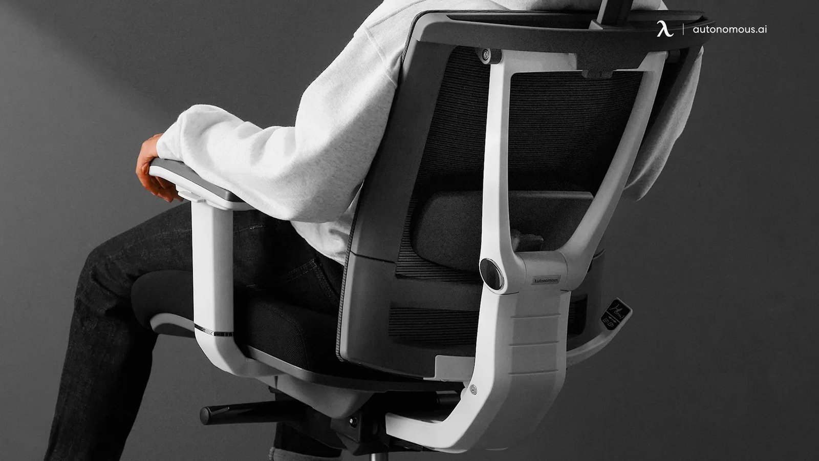 Adjustable levers on an ergonomic chair used to maintain proper posture and back health.