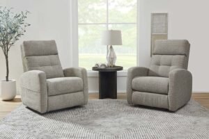 A comfortable armchair in a bright living room represents the best chairs for living room.