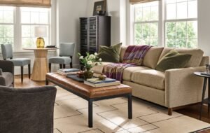A compact two-seater sofa fits perfectly in a bright and modern small living room.