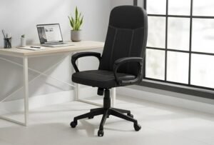 An ergonomic office chair sits in a bright, modern home office workspace.