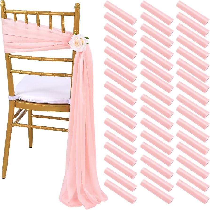 Different styles of chairs are lined up in a bright and airy studio space.