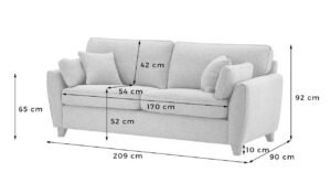 A modern three seater sofa sits elegantly in a bright, spacious living room.