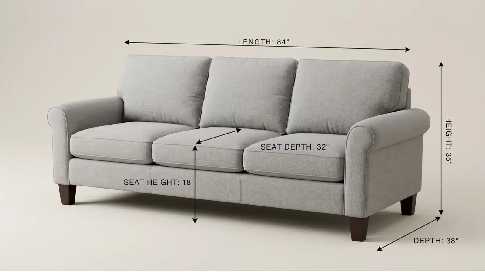 A tape measure confirms the width of a three-seater sofa in a living room.