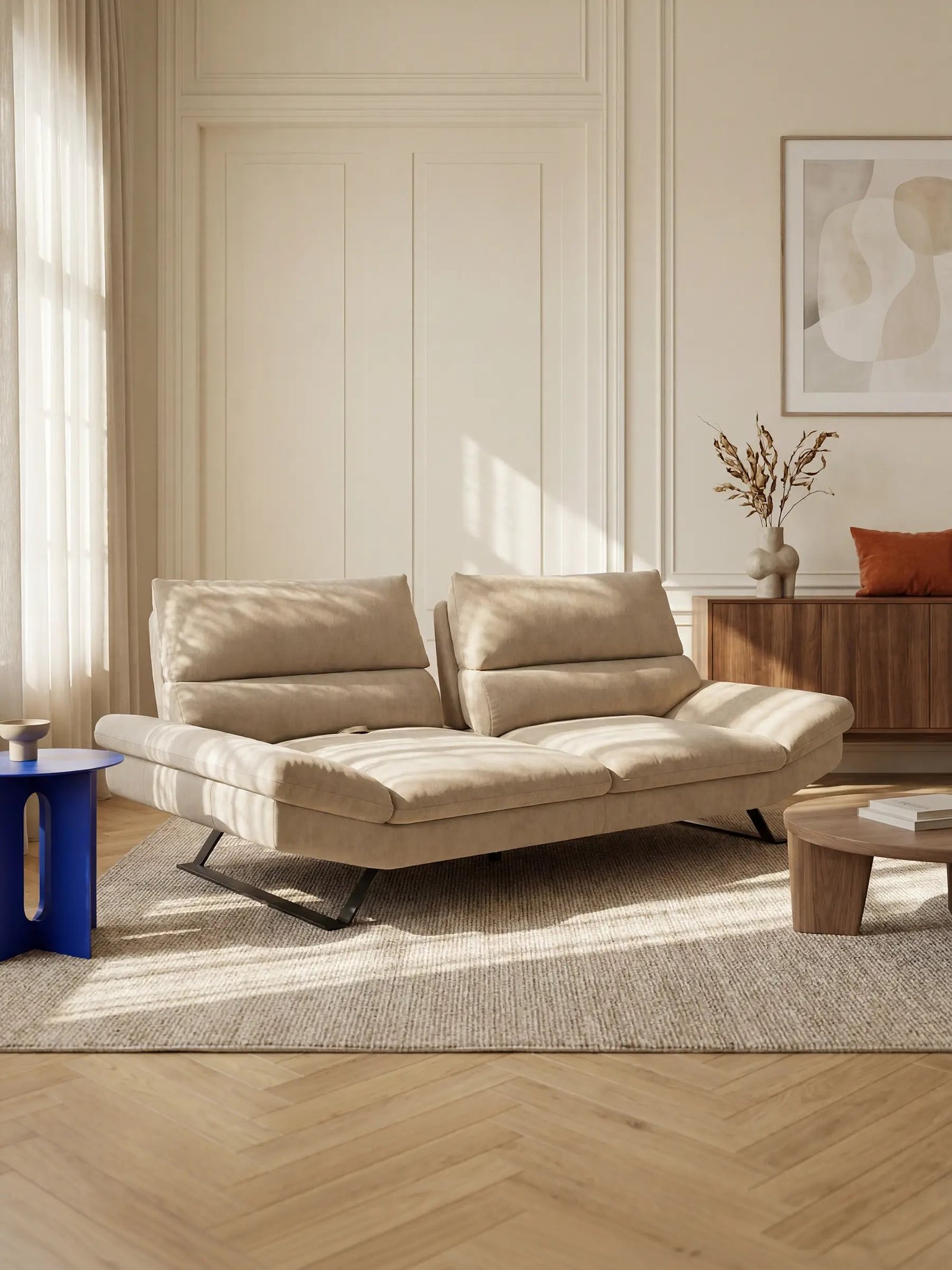A 3 seater sofa is perfectly positioned in a room with clear walkways.