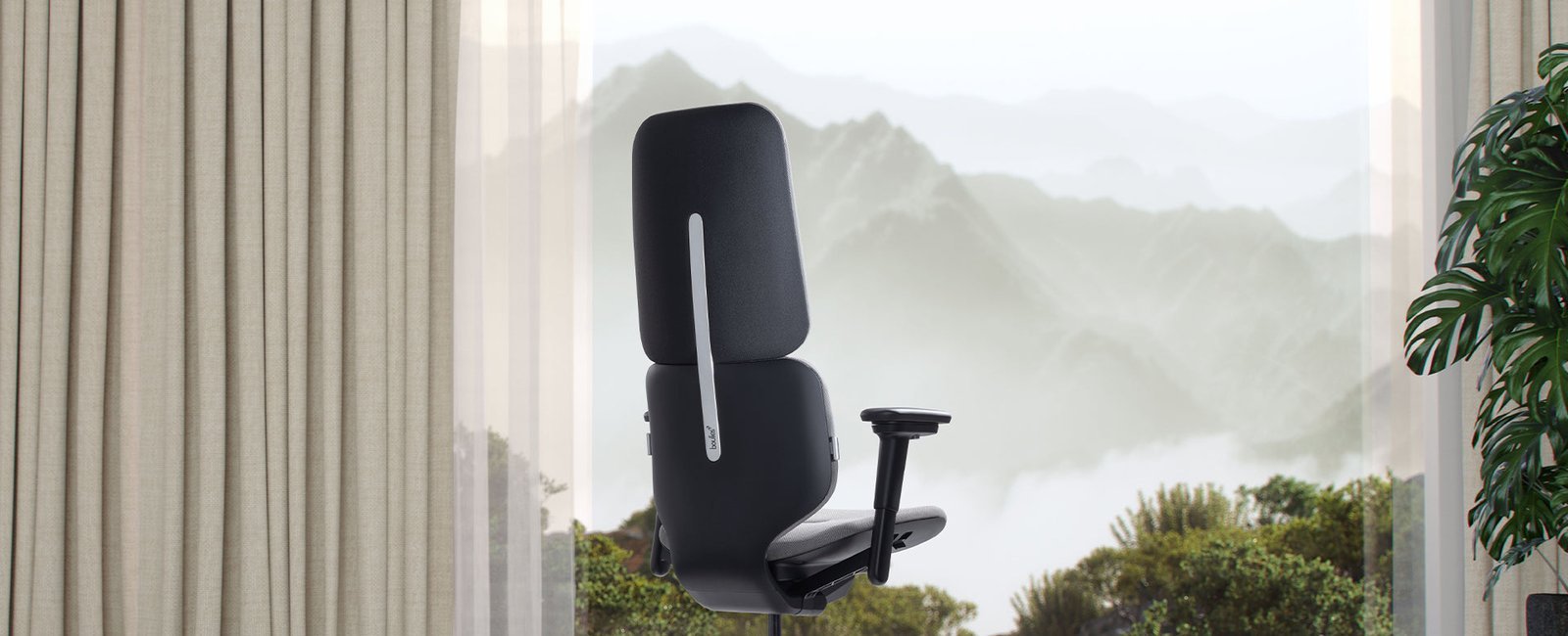 A mid-range ergonomic office chair with mesh back sits in a modern workspace.