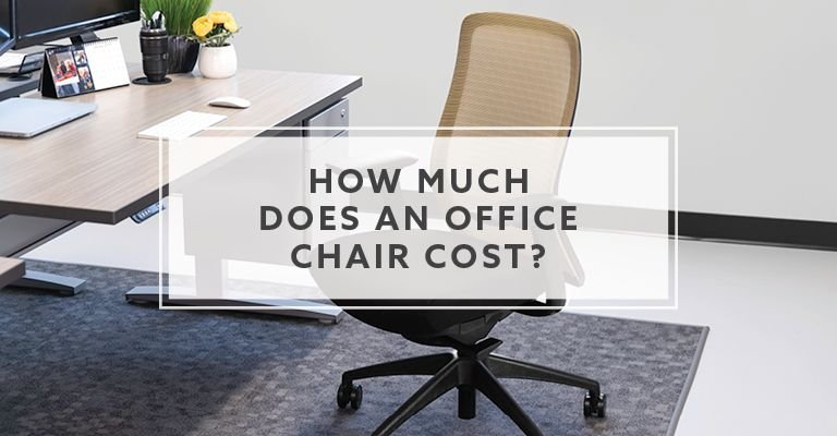 A modern ergonomic office chair sits in a bright, professional workspace setup.