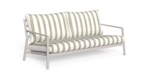 A modern 3 seater sofa sits in a bright living room as the main feature.