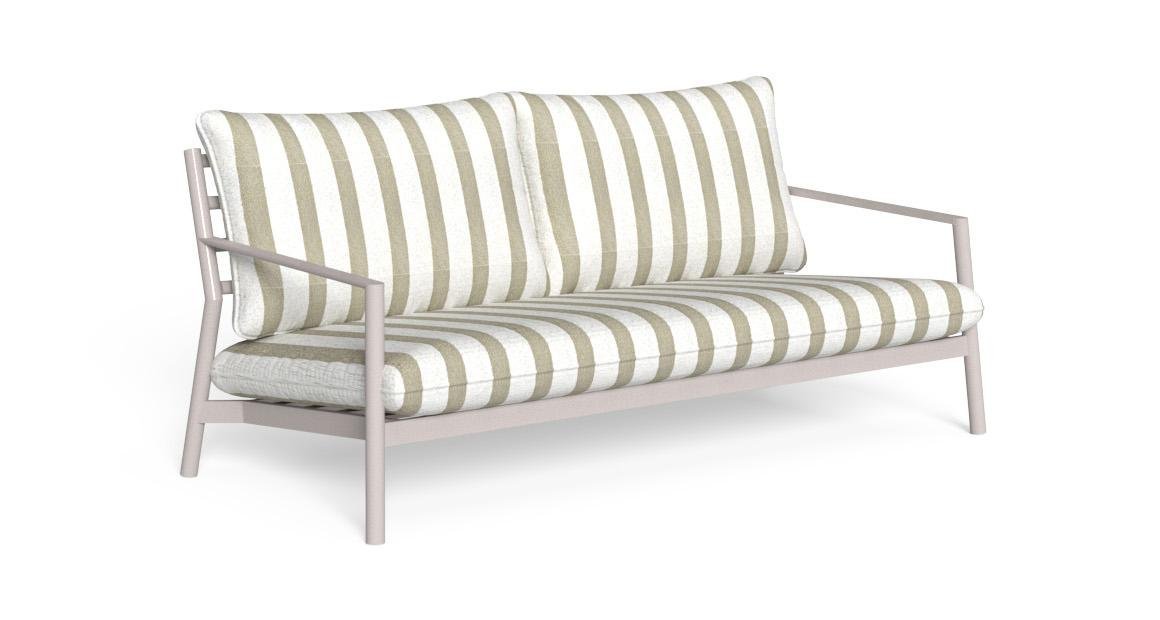 A modern 3 seater sofa sits in a bright living room as the main feature.