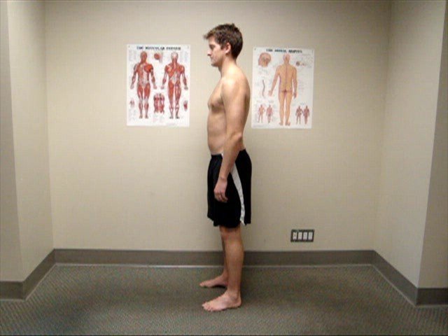 A person demonstrating poor posture with forward head tilt causing neck strain.