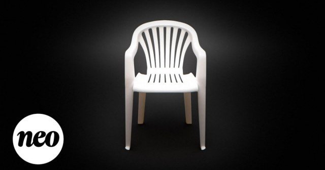 Three different versions of a designer chair lined up in a bright room.