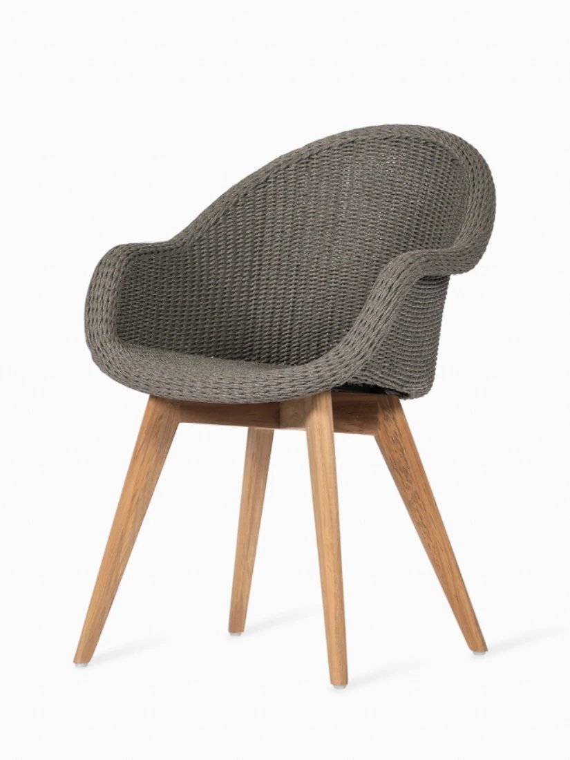 A modern chair displayed in a clean space for a product question and answer session.