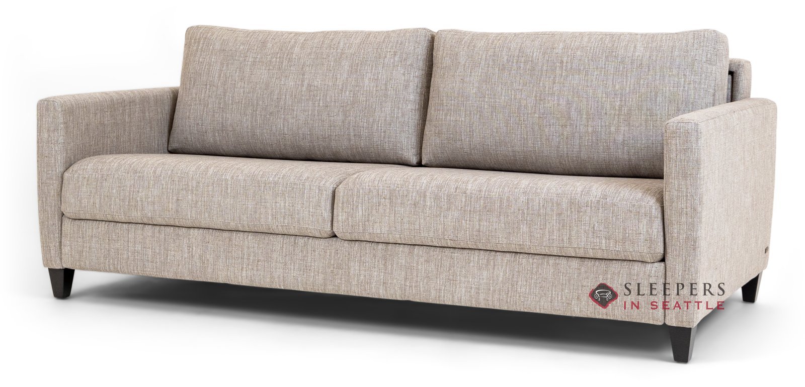 A comfortable deep-seated sofa with throw pillows and blankets to evoke emotional appeal.