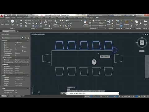 A clean desk setup showing CAD software help resources for chair design.