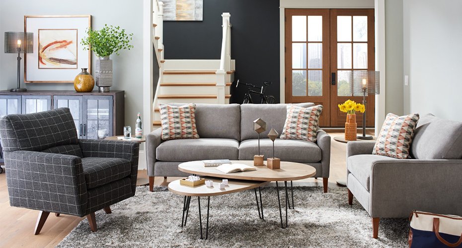 A stylish living room showing how to match a sofa and accent chairs.