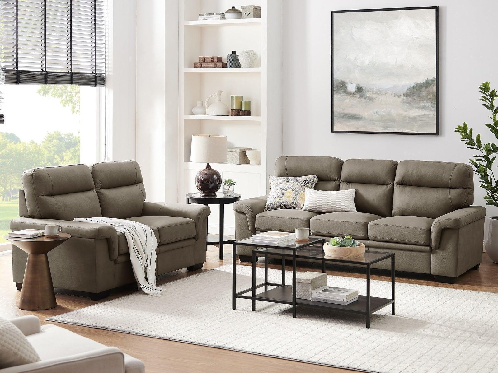 A perfectly balanced living room setup showcasing how to pair sofa and chairs.