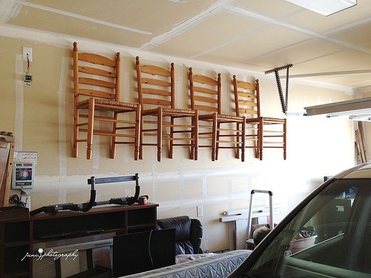 Various packing supplies laid out for protecting dining room chairs during storage.
