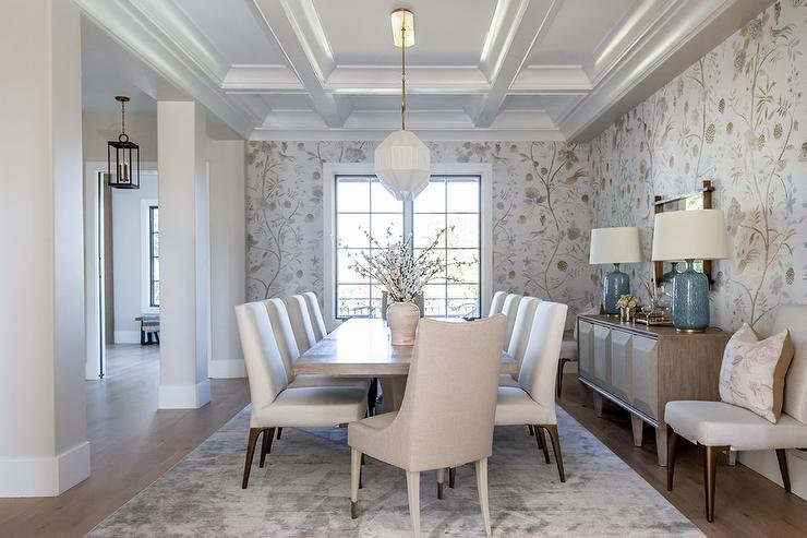 A stylish dining room chair repurposed as an accent piece in a bright living room.