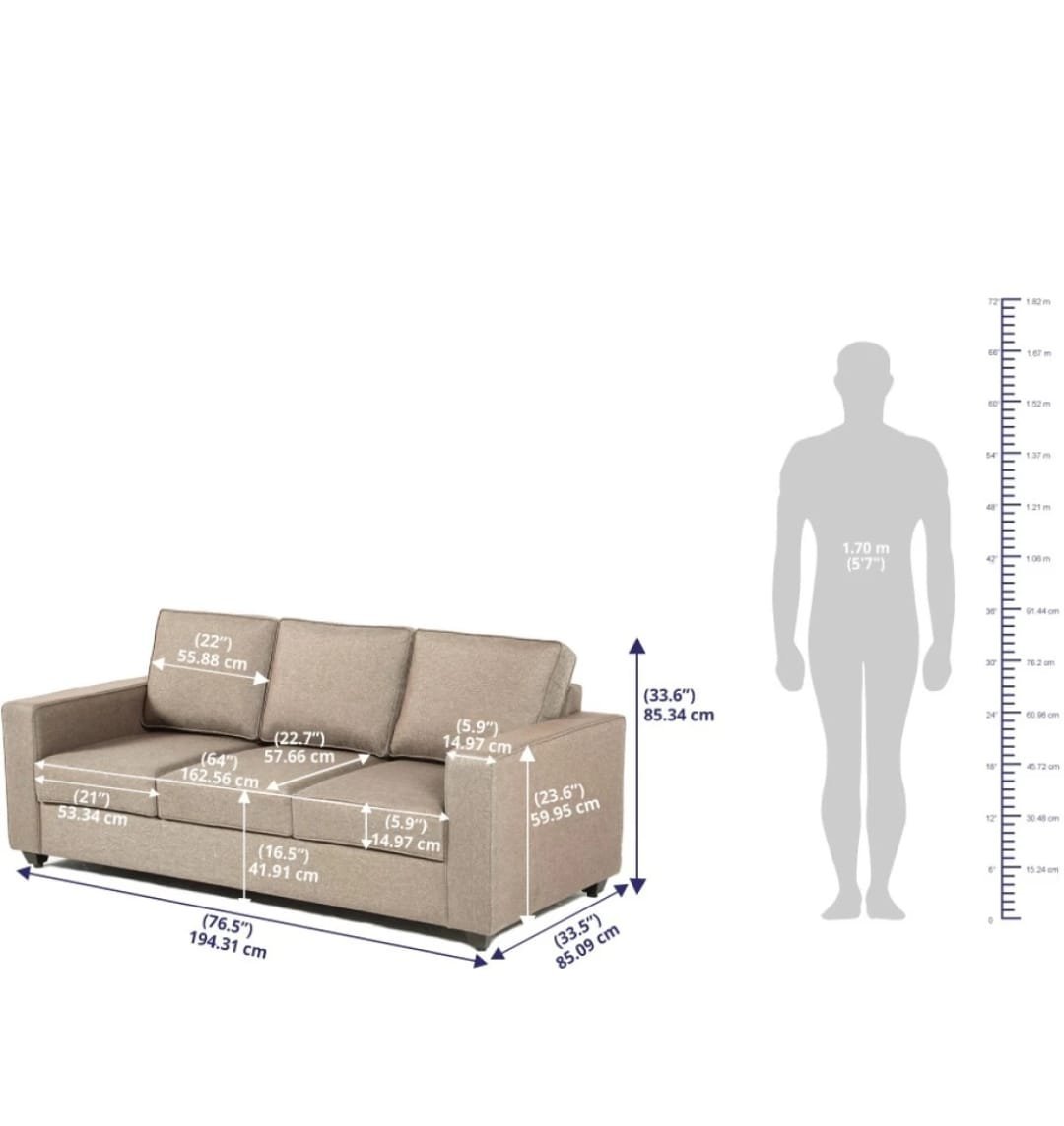 A measuring tape indicates the total width of a contemporary track-arm sofa.
