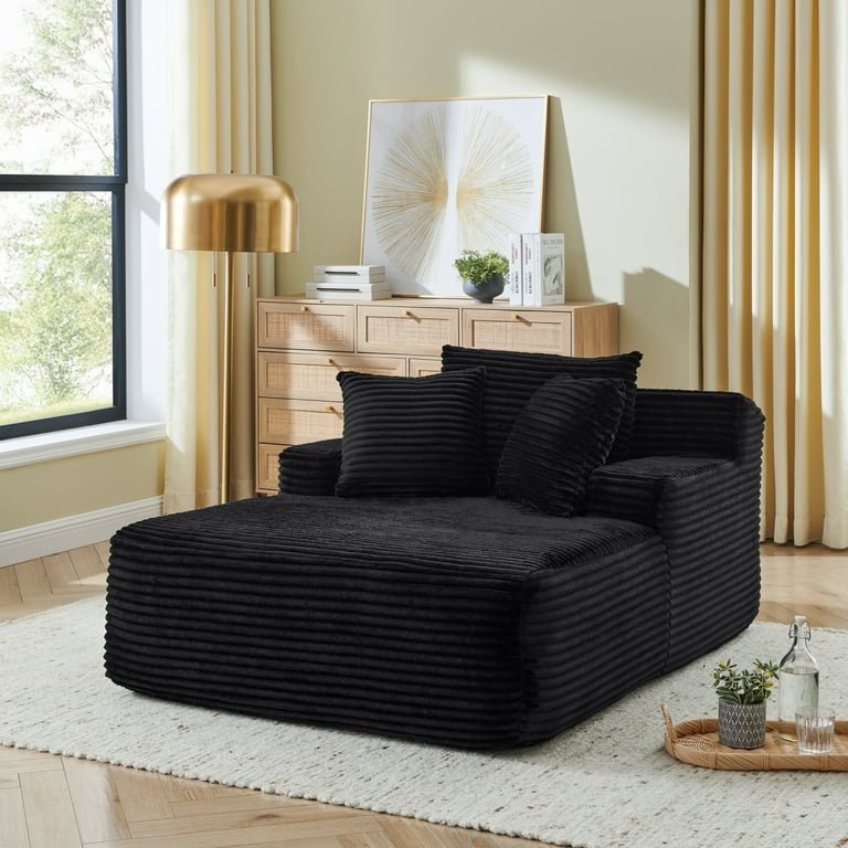 Different styles of lounge chairs arranged to show varied width and space requirements.