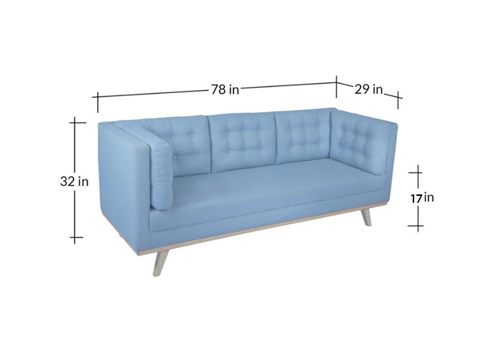 Hands unscrewing a sofa leg to help the piece fit through a doorway.