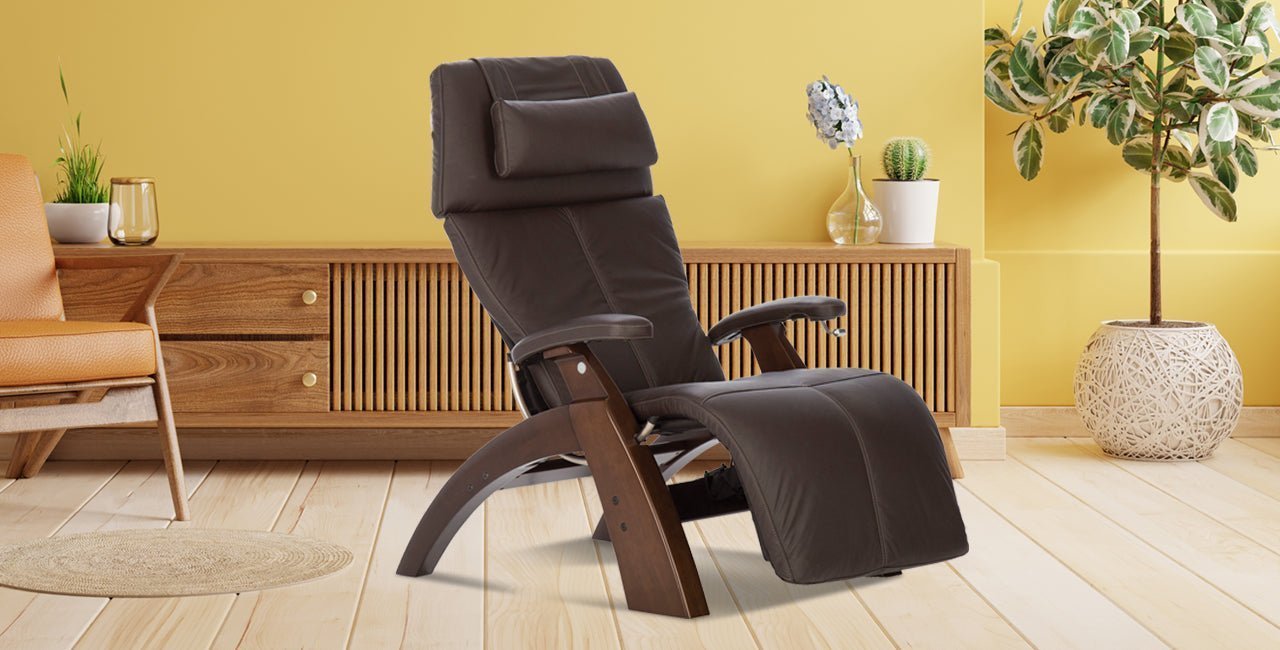 Adjusting a leather chair to ensure proper ergonomic support for back health.