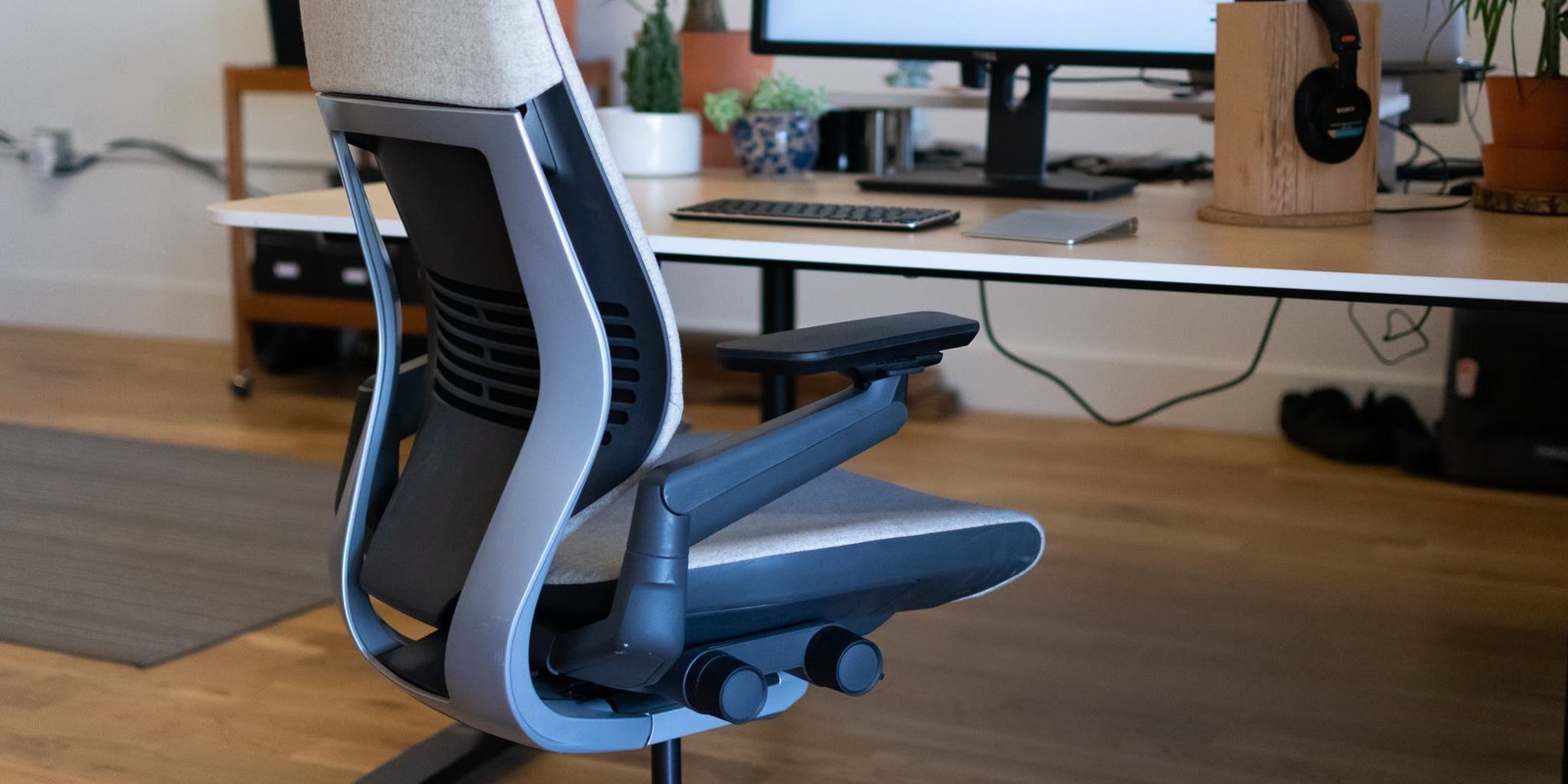An office chair receives an asset tag to distinguish it as business equipment.