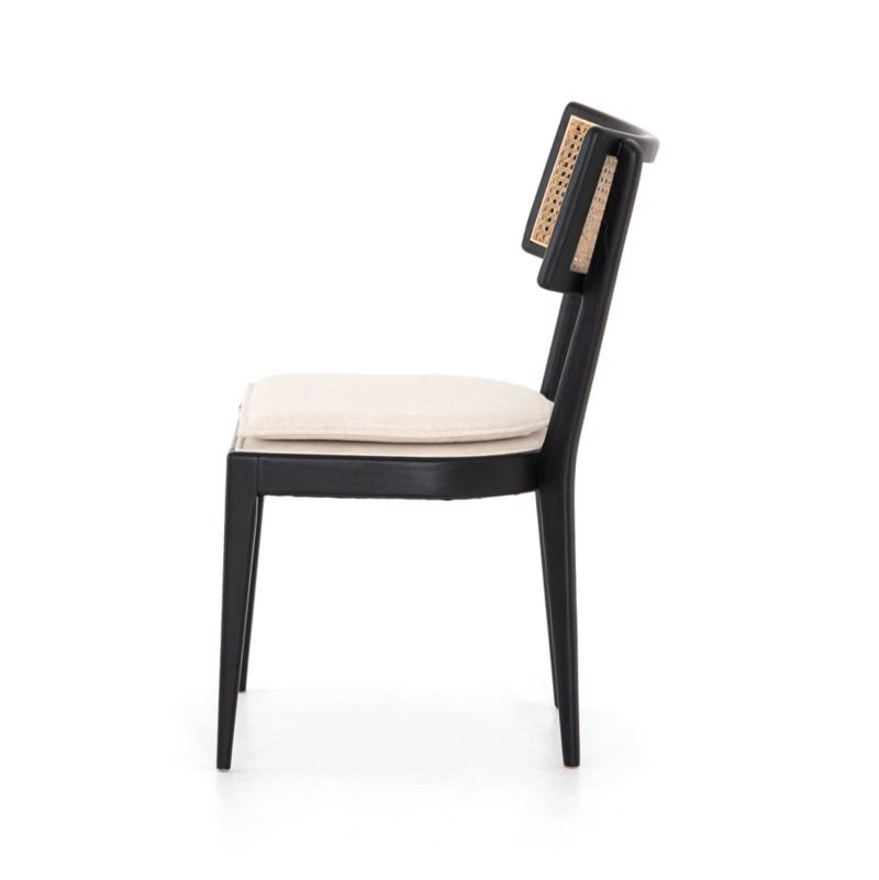 A detailed view shows the sturdy construction and quality finish of the Libby black wood dining chair.