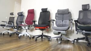 A modern ergonomic office chair sitting in a bright and clean home office.