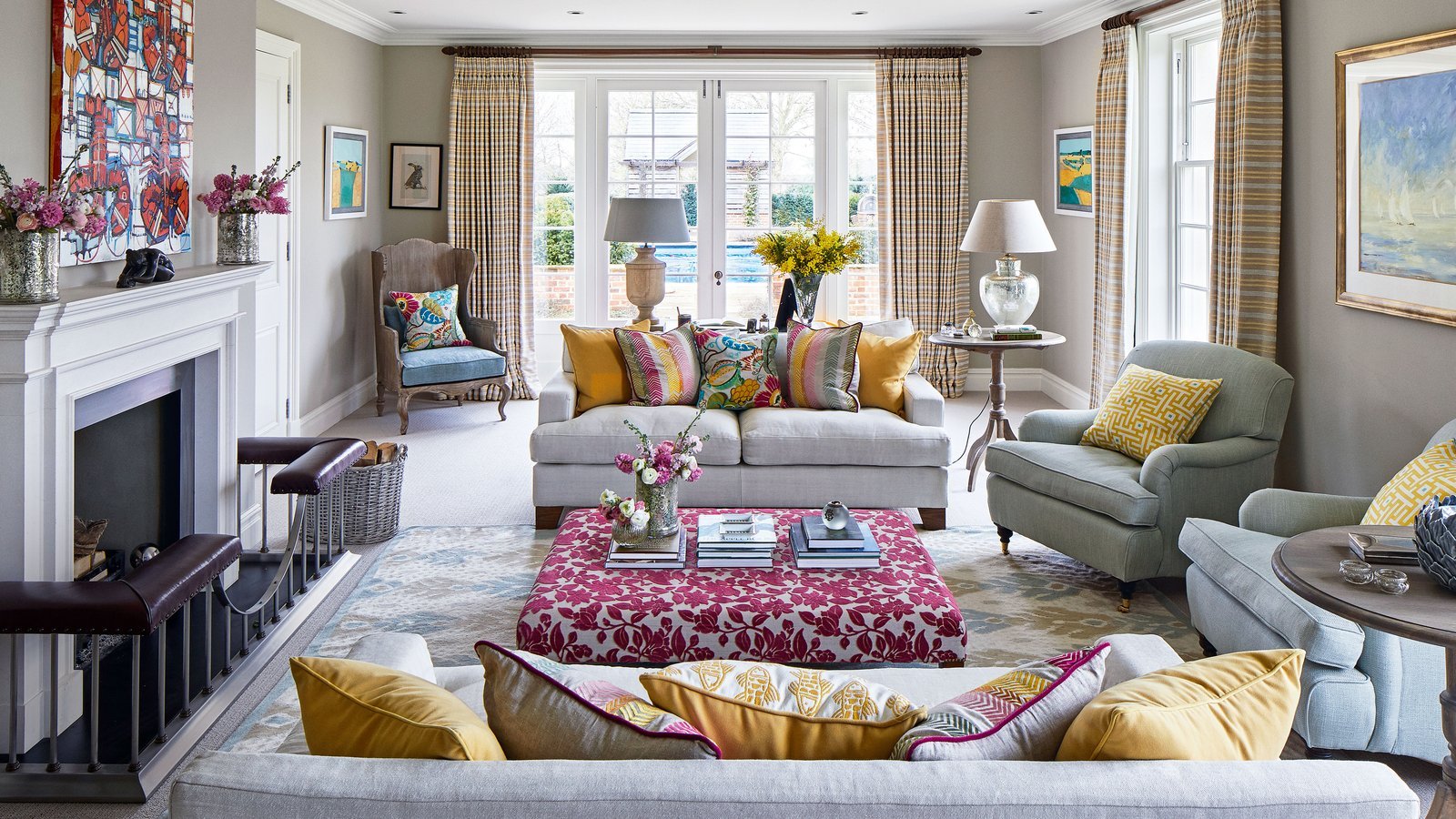 A modern sofa with exposed legs positioned to maximize small room space.