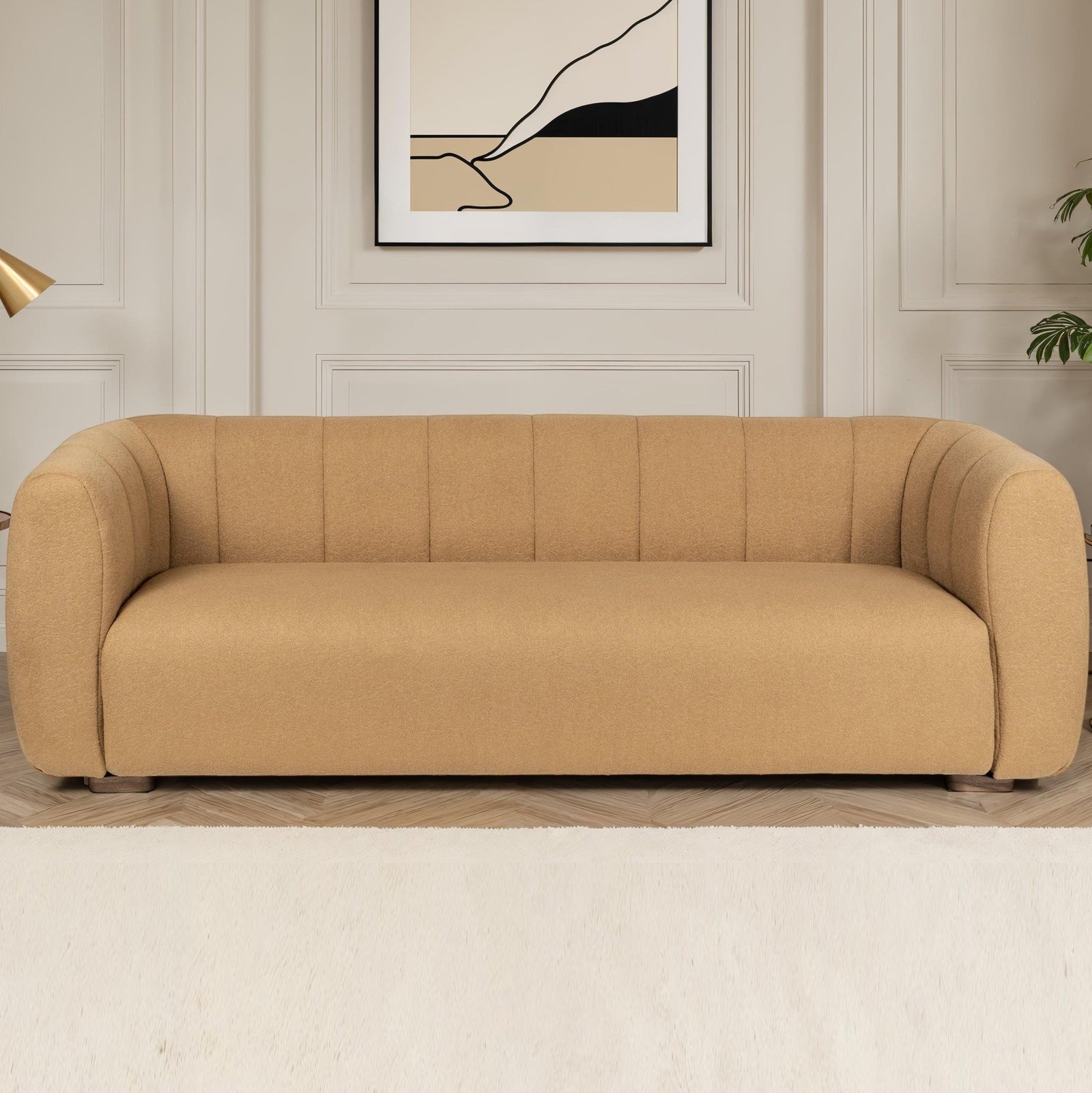 Testing the cushion density to verify the structural quality of a 3 seater sofa.