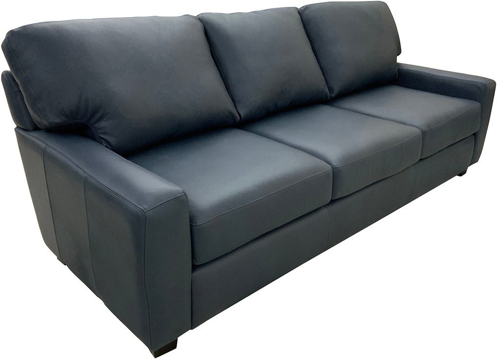 Detail view of high-quality sofa seams and firm cushions showing expert craftsmanship.