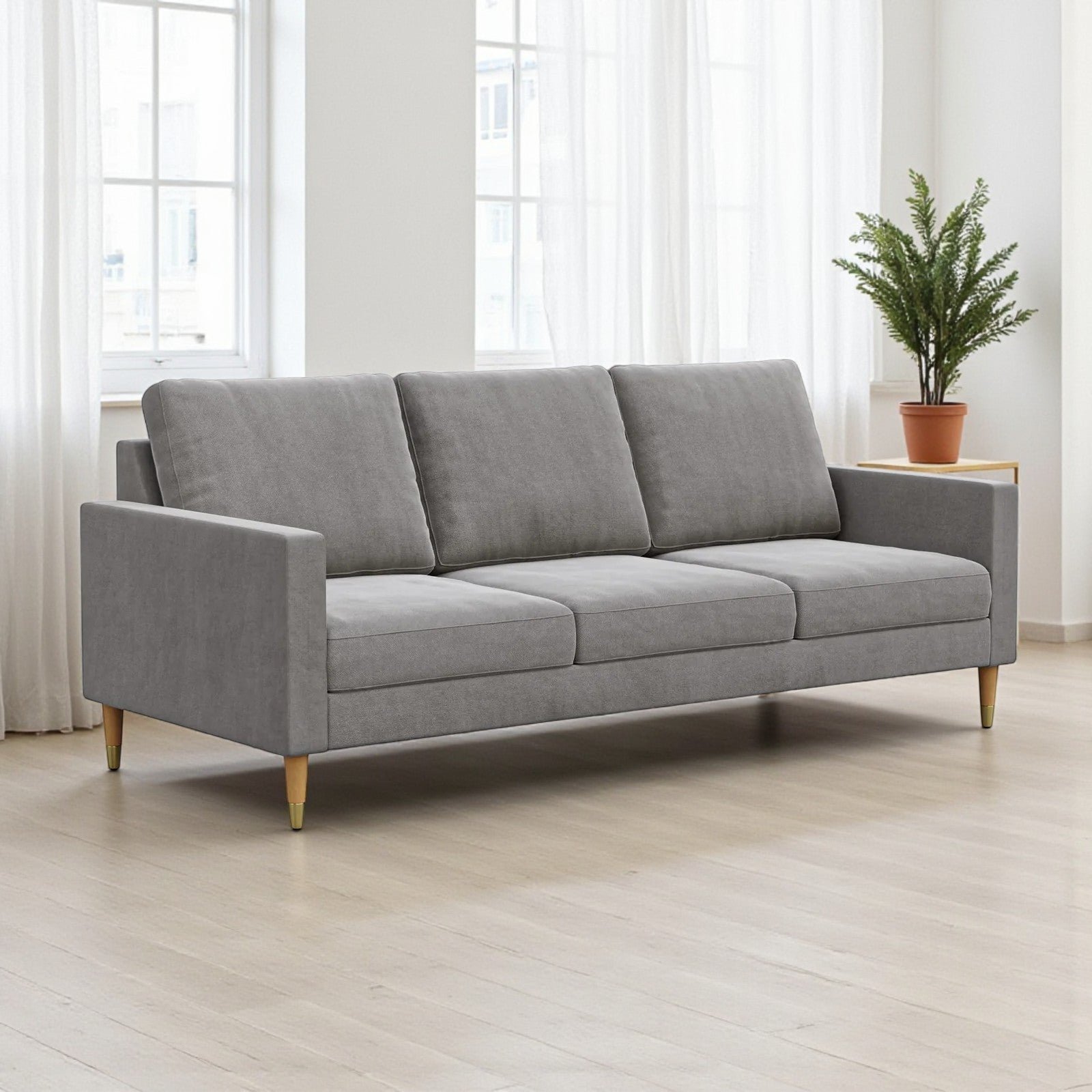 A measuring tape placed on a three-seater sofa to verify its standard dimensions.