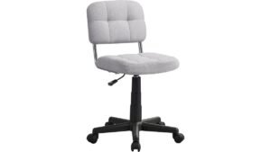 A modern stationary desk chair positioned at a clean wooden home office desk.