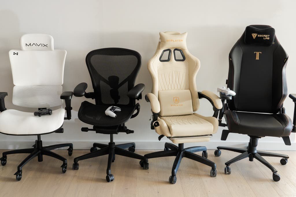 A clean and organized workspace with an ergonomic computer chair ready for work.