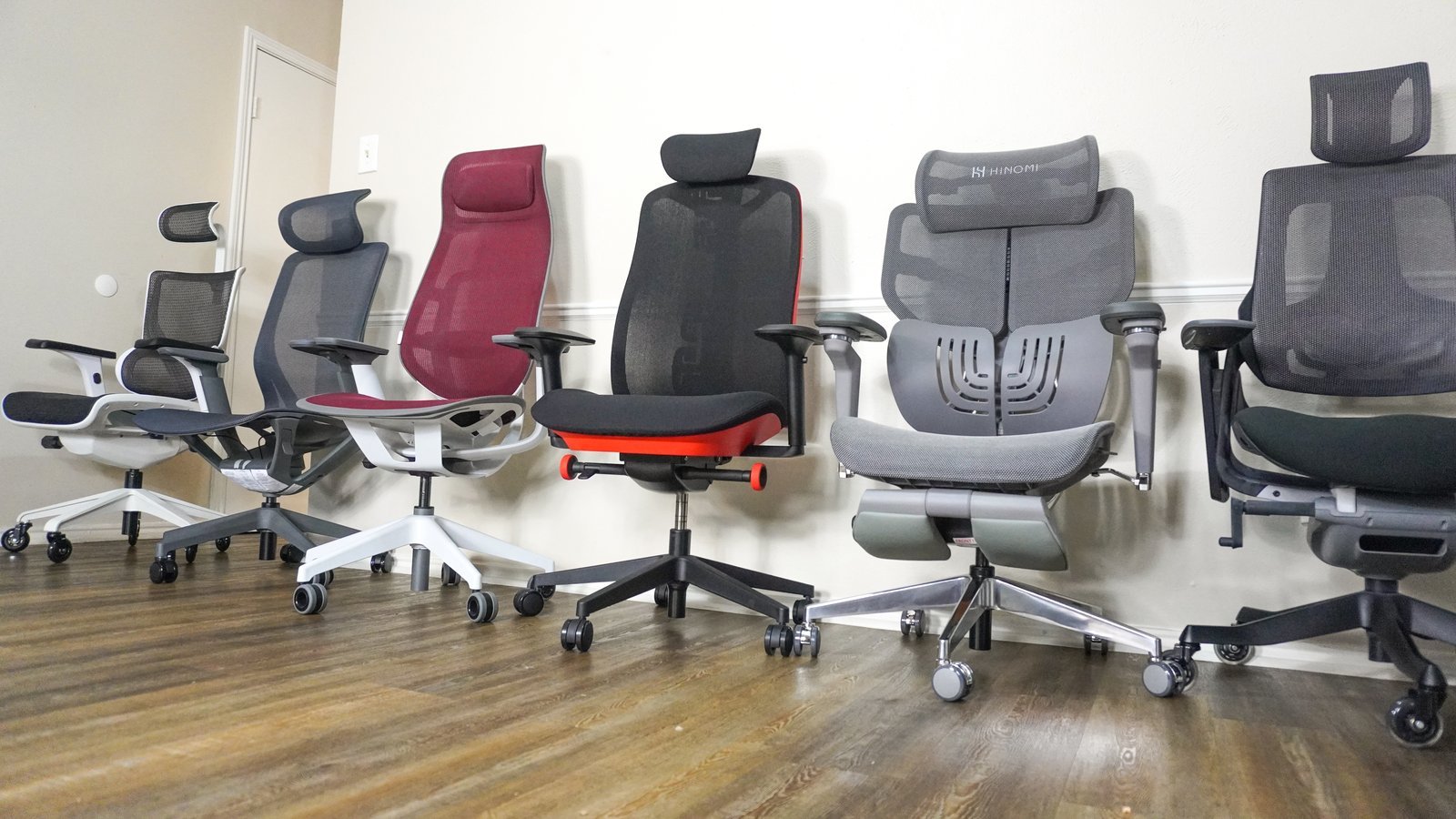 Side view of an ergonomic office chair highlighting lumbar support and adjustable seat depth.
