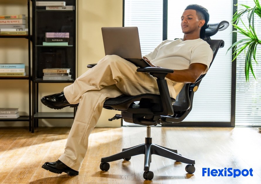 A well-organized home office featuring an ergonomic chair in a quiet, productive workspace.