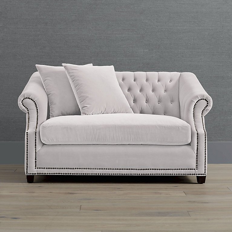 A fully extended twin sleeper chair creates a cozy guest bed space.
