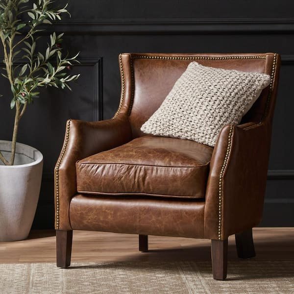 A durable and comfortable accent chair stands ready for use in a library.