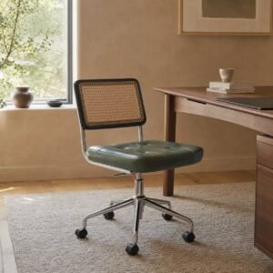 An ergonomic office chair stands in a modern, sunlit workspace for professional comfort.
