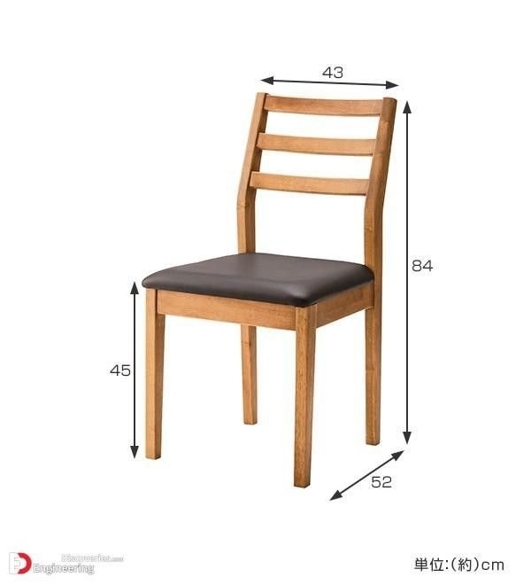 A lumbar pillow sits on an armchair to demonstrate how to adjust seat depth.