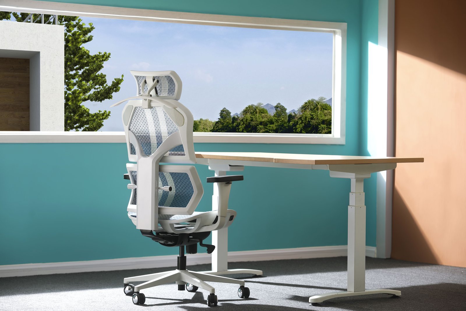 An organized desk and ergonomic chair setup in a quiet office.