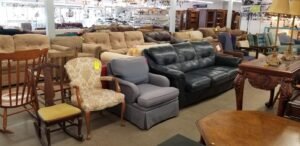 A bright furniture showroom displaying a variety of chairs for local shoppers.