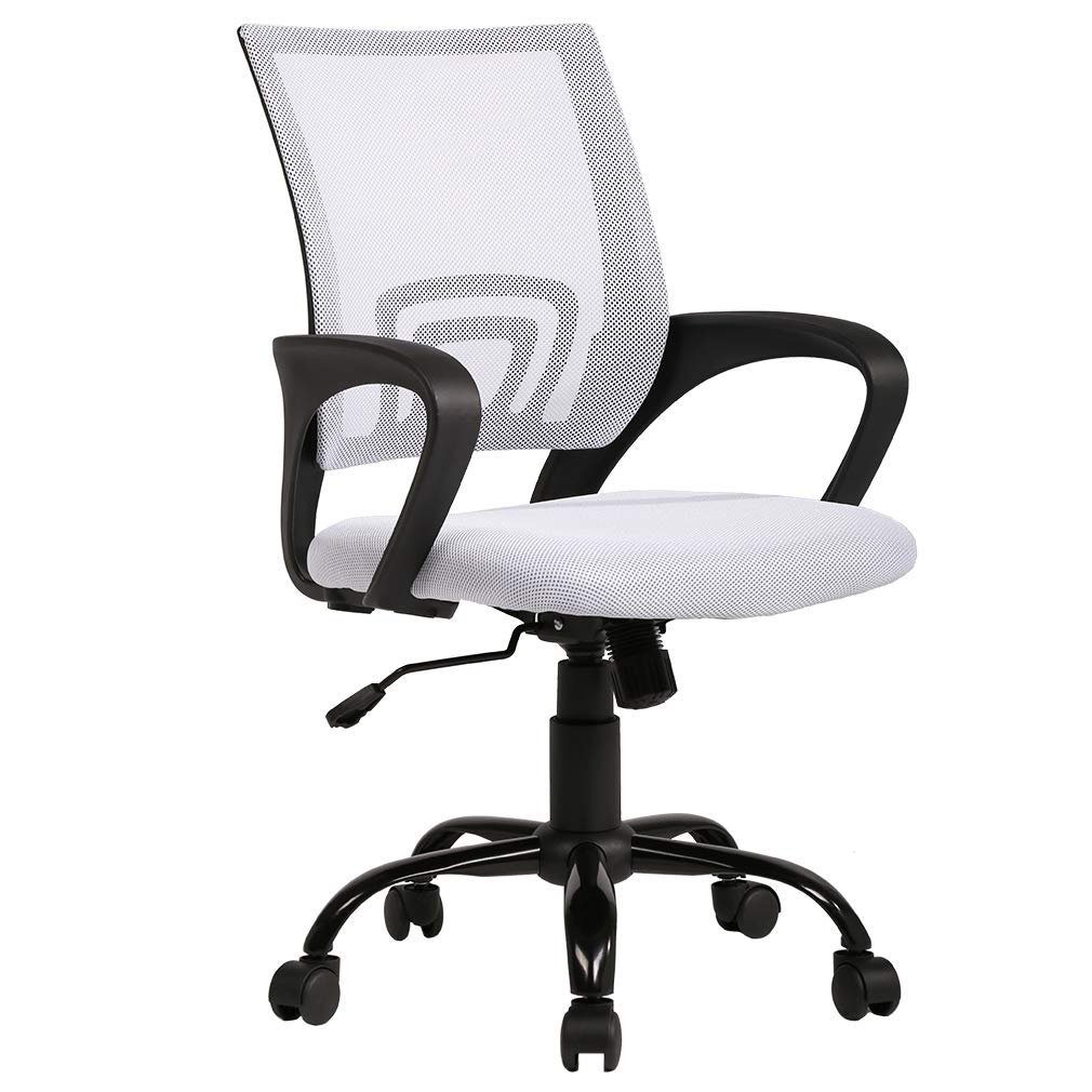 Several ergonomic office chairs are lined up for sale in a clean warehouse space.