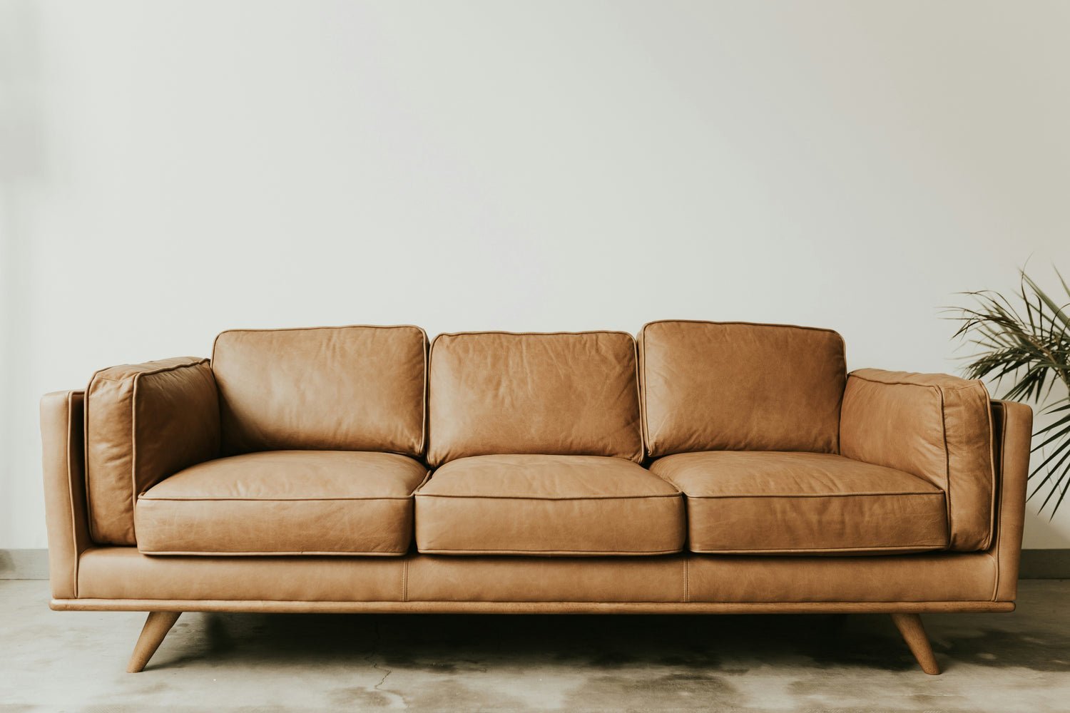 Detailed view of high-quality hardwood frame construction inside a modern couch.