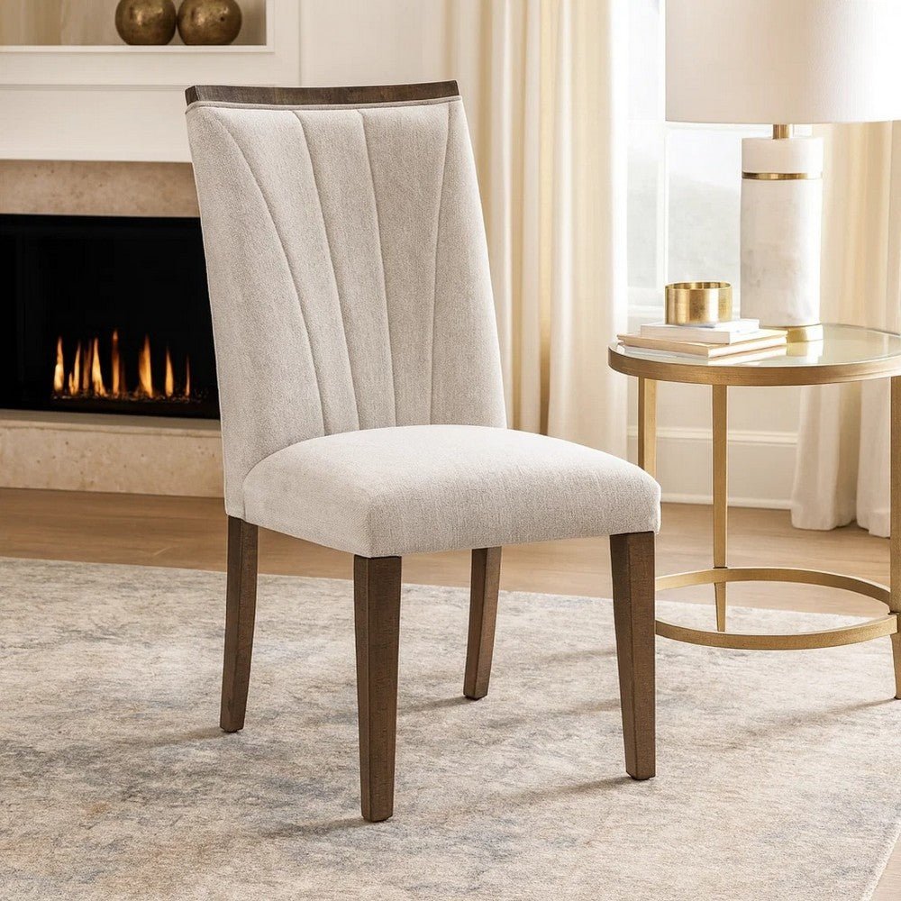 Professional white glove delivery service assembling new dining chairs in a home.
