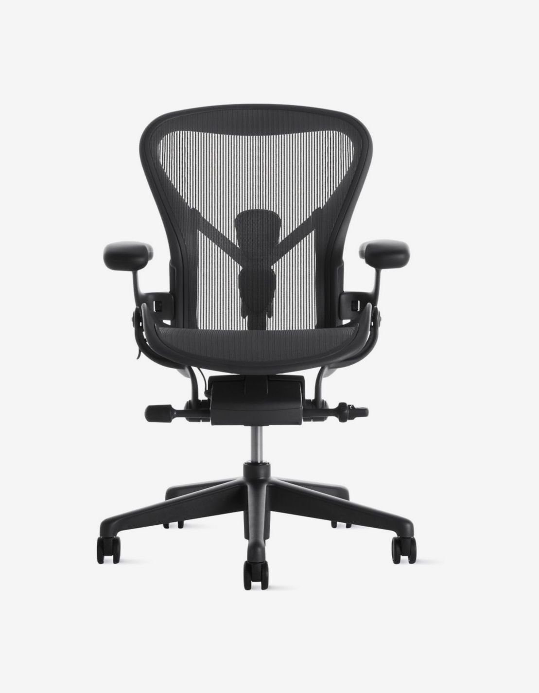 A person working comfortably in an ergonomic office chair, representing common office setup questions.