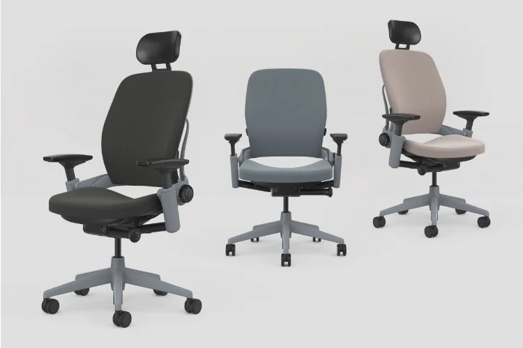 An individual demonstrating proper ergonomic alignment while sitting in a supportive office chair.