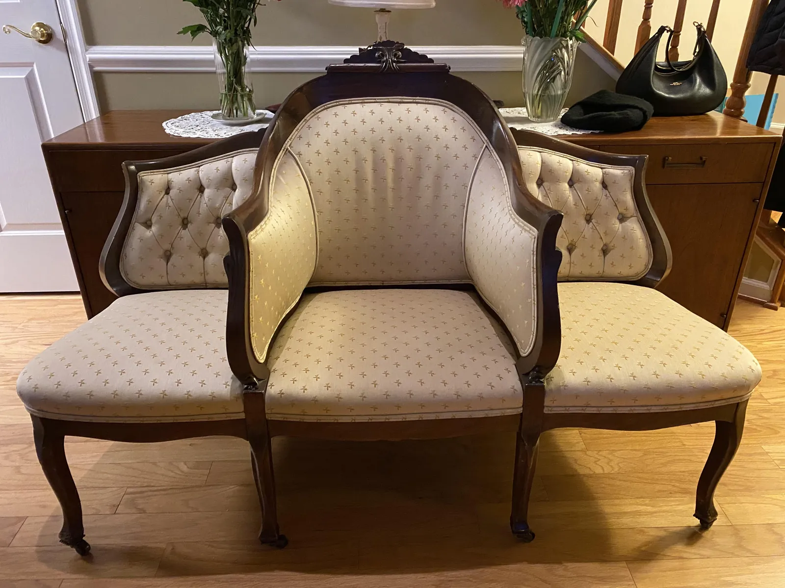 An armchair and a side chair placed side by side for visual comparison.