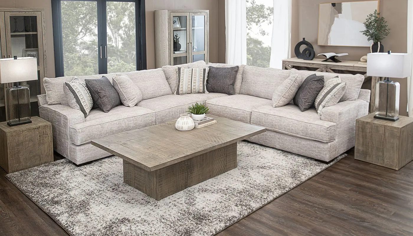 Assembling modular sectional pieces by connecting the base frames together.